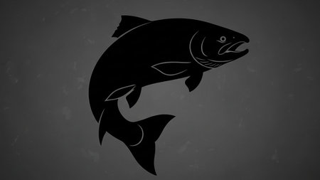 Detailed black silhouette of a salmon fish on a dark gray backgroundの素材