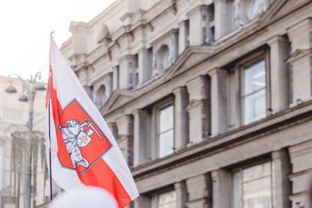 Minsk Belarus - August, 2020:Peaceful protest in Minsk. In the hands of protesters, people carry a white-red-white flag with the chase emblem. Horizontal photoのeditorial素材