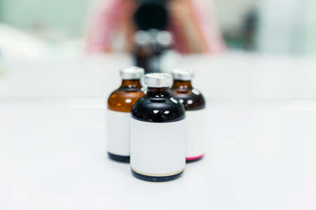 blank packaging transparent glass dropper serum bottle isolated on white background  ready for cosmetic product design mockup. Horizontal photoの写真素材