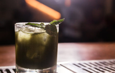 Green cocktail witn rum and mint, selective focus. Horizontal photoの写真素材