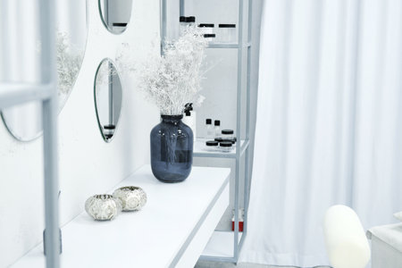 Table with decor in the office of a beauty specialist. Stylish interior. Horizontal photoの写真素材