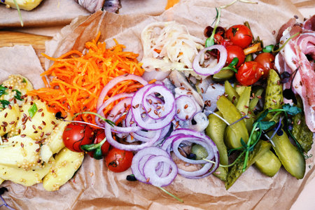 Mix of pickled vegetables on a banquet table. Horizontal photoの写真素材
