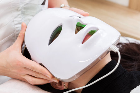 LED Light Facial Mask Treatment in Progressの写真素材