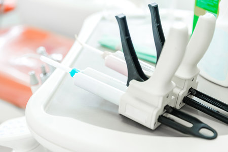 Close-up of dental instruments arranged on a tray in a modern dental clinic,の写真素材