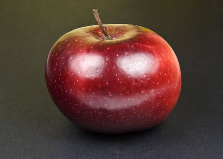 Happy Red Delicious Apple on black background