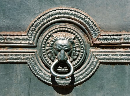 Knocker on an old door in the city of Lisbonの写真素材
