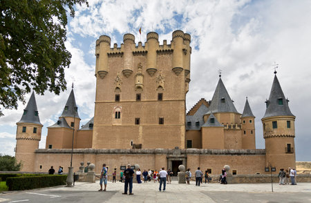 Tourists around the El Alcazar castle in Segovia, Spain