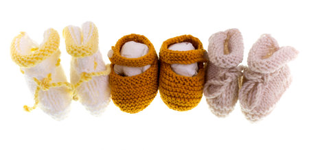 Handmade variety of knitted shoes and booties