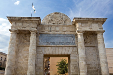 Detail of the Puerta del Puente, a Renaissance gate with a central square passage, sided by two couples of Doric columns, surmounted by a Classic-style entablature in CÃ³rdoba, Spainの写真素材