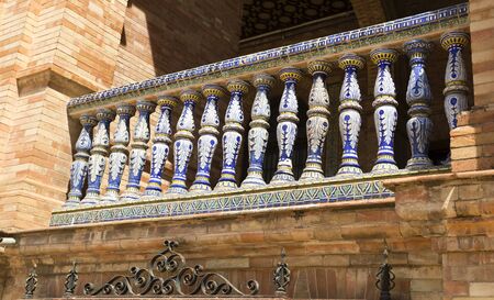 Detail of the beautiful ceramic balustrade at the Plaza de Espana (Spain Square) in Seville, Spainの写真素材