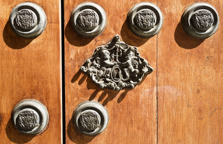 Closeup at the wonderful cast iron locker of the main door of the Archbishop Palace in Seville, Spainのeditorial素材