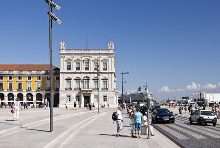 View of the east side of the Commerce Square, cruise ship and tourists visiting Lisbon, Portugalのeditorial素材