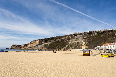 View of the magnificent beach of the fishing village of Nazare, Portugalのeditorial素材