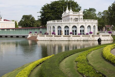 The Devaraj-Kunlai Gate is a semi-circle building used by the king to access the inner court at the Bang Pa-in Palace compound, Thailand.の写真素材