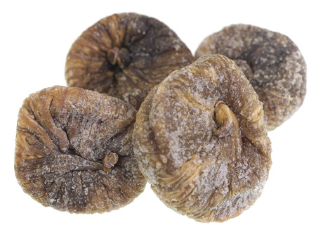 Dried figs isolated on white background. Figs grow on the Ficus tree (Ficus carica).の写真素材