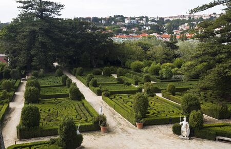 View of the french inspired geometric shaped shrubs of boxwood (Buxus sempervirens) in the Royal Gardens of Caxias, Portugalの写真素材