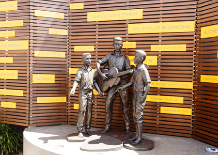 Statue of the young Bee Gees at the Celebration Memorial (by Phillip Piperides) in their home town of Redcliffe, Queensland, Australiaの写真素材