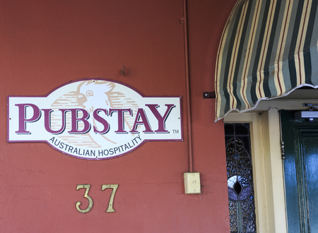 Detail of the PUBSTAY sign of the centenary Culcairn Hotel, which opened in 1891 in the south-east Riverina region of New South Wales, Australiaのeditorial素材