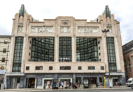 The Eden Theater is an iconic building built in early 20th century decorative art style, with pilasters crowned by masks, in Lisbon, Portugalのeditorial素材