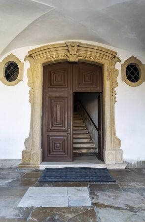 Entrance door to the church of the Monastery of Saint Mary, built in Baroque style, in Lorvao, Coimbra, Portugalの写真素材