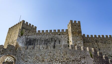 View of the hilltop medieval Castle of Montemor-o-Velho, built in the 11th century and located on the banks of the Mondego River, near Coimbra, Central Portugalの写真素材