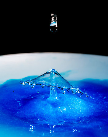 Blue water drop collision â€“ travelling in space
