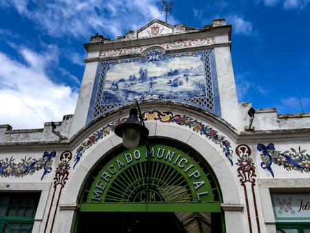Main entrance of the Municipal Market built in 1929 with a beautiful tiles panel depicting the spring season and a scene of the agricultural cycleの写真素材