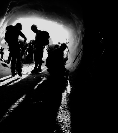 Silhouettes of mountaineersの写真素材