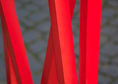 Red wooden fence bars in abstract compositionの写真素材