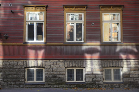 Sunlight reflections from windows on historic building in Tallinn