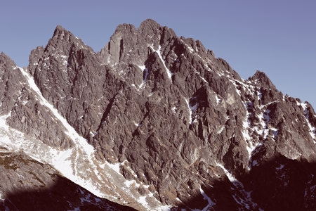 Retro shot of mountain peaks in High Tatras in Velka Studena dolynaの写真素材