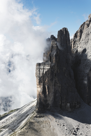 Foggy and cloudy mountains scenery in the Alpsの写真素材