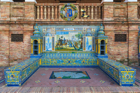 Ceramic tiles in Plaza de Espana in Seville with the theme of the province of Toledo, in Spainの写真素材