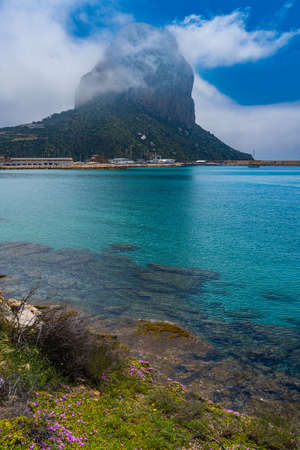 View of the Penon de Ifach in the city of Calpe, in Alicante, Spainの写真素材