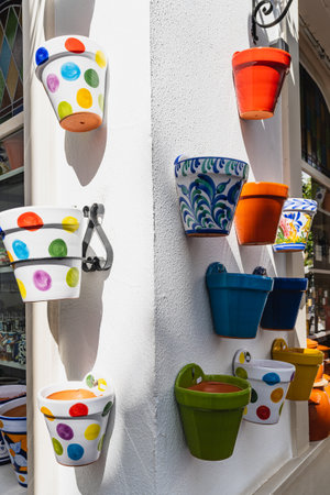 Cordoba, Spain, March 7, 2022. Colorful potsherds on a white facade in the city of Cordoba,. Spainのeditorial素材