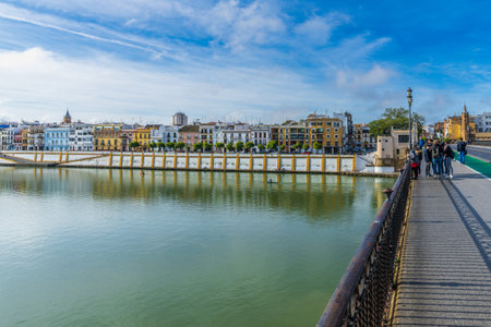 Seville, Spain, March 13, 2022. Guadalquivir river and Triana neighborhood in the city of Sevilleのeditorial素材