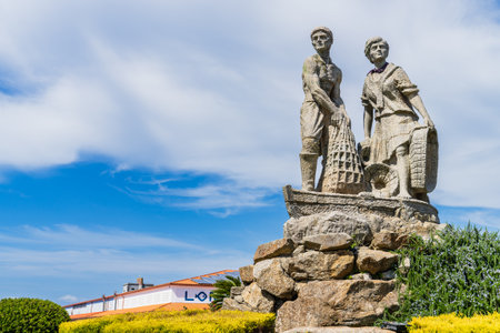 El Grove, Pontevedra, Spain, September 8, 2023. Monument to the shellfish farming family next to the O Grove Market, in Pontevedra, Galicia.のeditorial素材