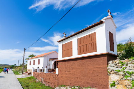 Ons Island, Pontevedra, Spain, September 7, 2023. House and typical horreo on Ons Island, in Pontevedra, Galicia.のeditorial素材