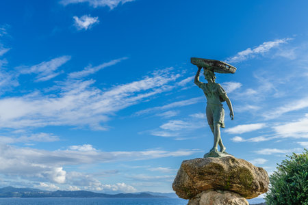 Portonovo, Spain, September 9, 2023. Sculpture tribute to the fishwives of the town of Portonovo, in Pontevedra, Galiciaのeditorial素材
