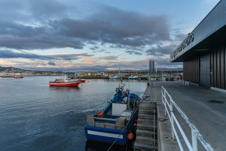 Portonovo, Spain, September 9, 2023. View of the port and the fishing market of Portonovo at sunset, in Pontevedra, Galiciaのeditorial素材