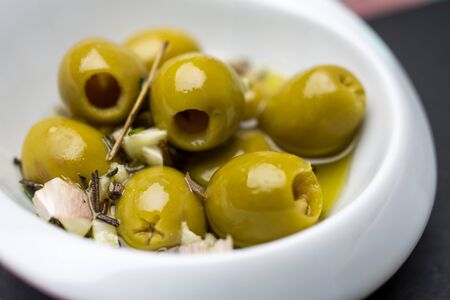 closeup of the seasoned olivesの写真素材