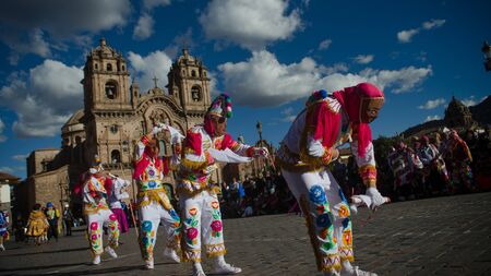 People doing traditional dancing at the square of the city of Cuzcoのeditorial素材