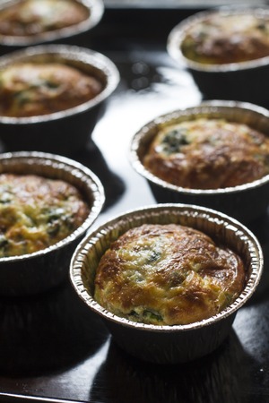 Casserole with Eggs, Spinach and Parmesan freshly bakedの写真素材