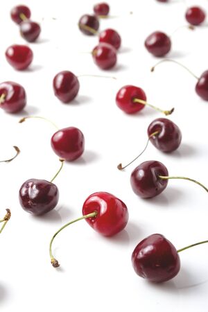 Group of Cherries arranged on white backgroundの写真素材