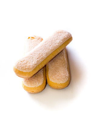 Italian Savoiardi cookies on a white background, close-upの写真素材