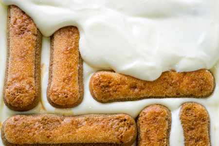 Close up of a biscuit with sour cream on a white backgroundの写真素材