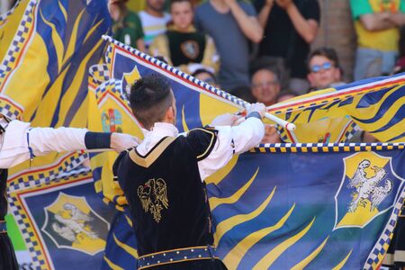 Ferrara, Italy - 10 may 2015 - Palio, the city celebrates with competitions of the flag wavers and the parade of the districtsのeditorial素材