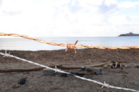 A boat sitting on top of a sandy beachundefinedの写真素材
