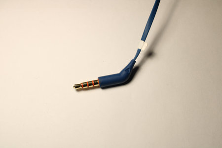 blue earphones on white background - connector