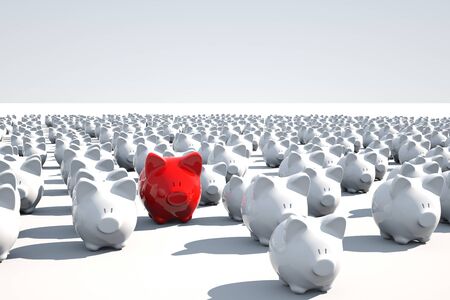 one red and many white piggy bank on white backgroundの写真素材